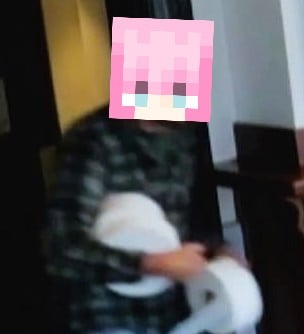 hoshi steals toilet paper.jpg